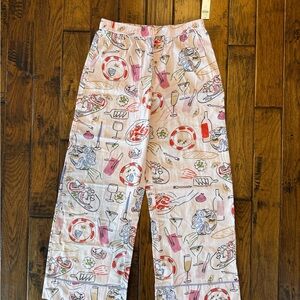 Women’s pajamas pants from Anthropologie with fun dinner print. Brand LyreBird